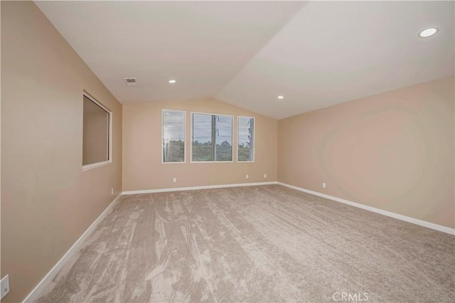 5338 S Chariton Ave, Ladera Heights, CA 90056 - spare room with vaulted ceiling, baseboards, light colored carpet, and recessed lighting
