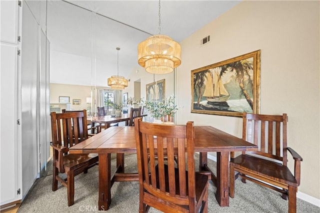 3501 W Greentree Cir Unit F, Anaheim, CA 92804 - dining space featuring a chandelier, light colored carpet, and baseboards