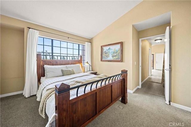 3501 W Greentree Cir Unit F, Anaheim, CA 92804 - bedroom featuring light carpet, baseboards, and lofted ceiling