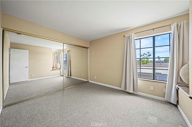 3501 W Greentree Cir Unit F, Anaheim, CA 92804 - carpeted empty room featuring baseboards and plenty of natural light