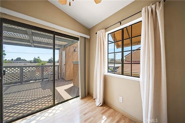 3501 W Greentree Cir Unit F, Anaheim, CA 92804 - entryway featuring lofted ceiling, wood finished floors, baseboards, and a ceiling fan