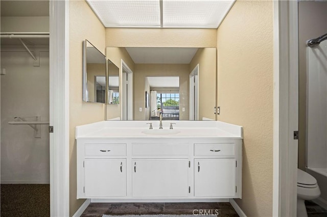 3501 W Greentree Cir Unit F, Anaheim, CA 92804 - full bath with vanity, a spacious closet, and toilet