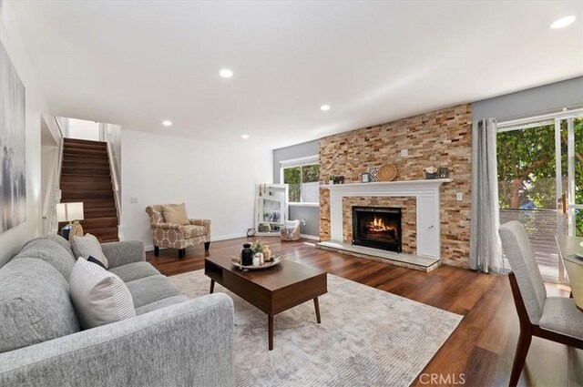 770 Libby Dr, Riverside, CA 92507 - living room featuring wood finished floors, stairs, recessed lighting, and a fireplace