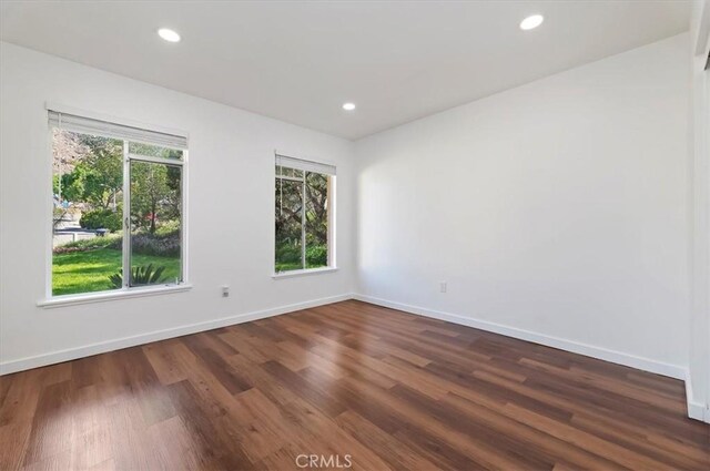 770 Libby Dr, Riverside, CA 92507 - spare room with dark wood-style floors, baseboards, and recessed lighting