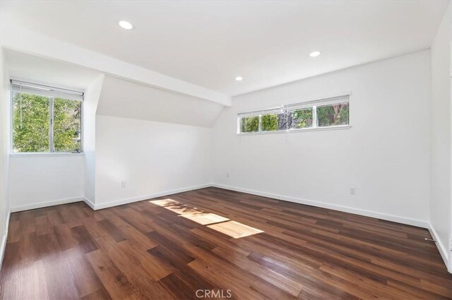 770 Libby Dr, Riverside, CA 92507 - spare room featuring vaulted ceiling, baseboards, wood finished floors, and recessed lighting