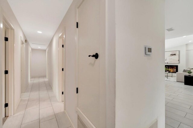 4103 Corral Canyon Rd, Bonita, CA 91902 - hall with recessed lighting and light tile patterned floors