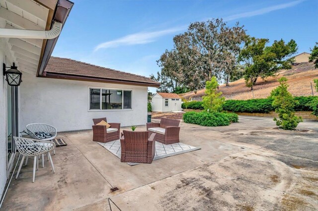 4103 Corral Canyon Rd, Bonita, CA 91902 - view of patio / terrace with a storage shed