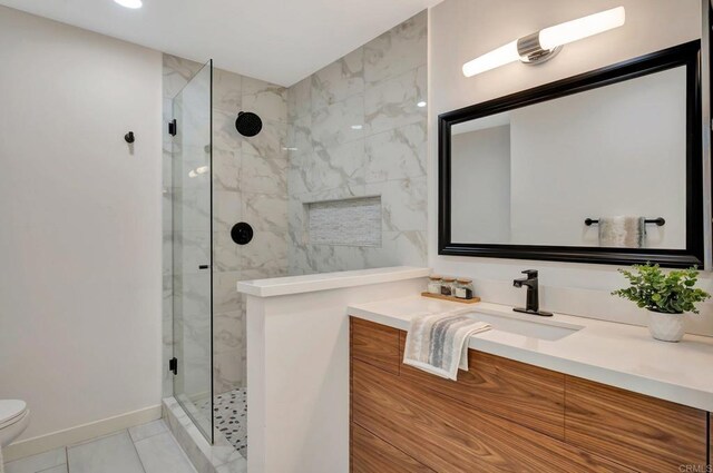 4103 Corral Canyon Rd, Bonita, CA 91902 - bathroom with vanity, a marble finish shower, and tile patterned flooring