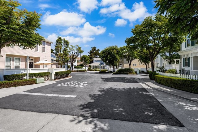 167 Iris Ln, Brea, CA 92821 - view of asphalt road with a residential view and sidewalks