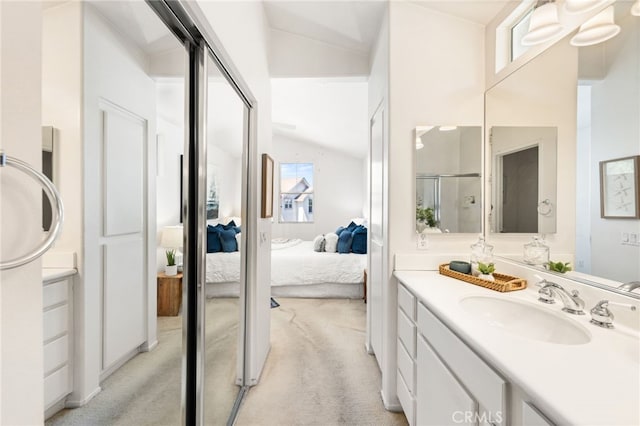 167 Iris Ln, Brea, CA 92821 - ensuite bathroom with vaulted ceiling, vanity, and a shower with door