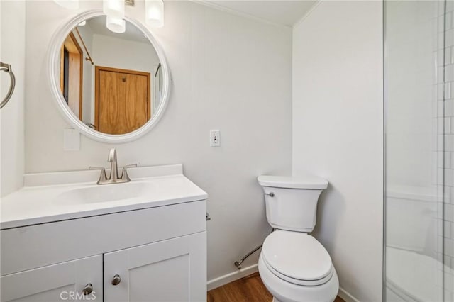 551 Raccoon Ct, Lake Arrowhead, CA 92352 - bathroom featuring toilet, vanity, baseboards, and wood finished floors