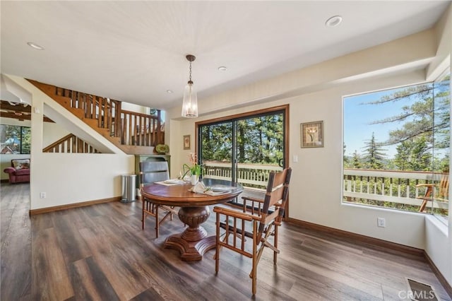 551 Raccoon Ct, Lake Arrowhead, CA 92352 - dining space with baseboards, wood finished floors, recessed lighting, and stairway