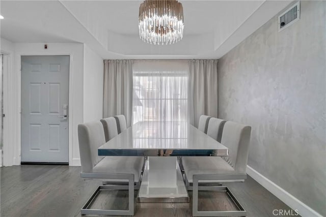 14347 Albers St Unit 207, Sherman Oaks, CA 91401 - dining space featuring a chandelier, baseboards, and wood finished floors