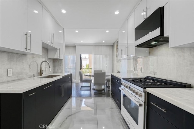 14347 Albers St Unit 207, Sherman Oaks, CA 91401 - kitchen featuring a sink, high end white range, dark cabinets, modern cabinets, and recessed lighting