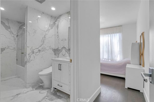 14347 Albers St Unit 207, Sherman Oaks, CA 91401 - ensuite bathroom featuring vanity, toilet, a combined bath / shower with marble appearance, and recessed lighting