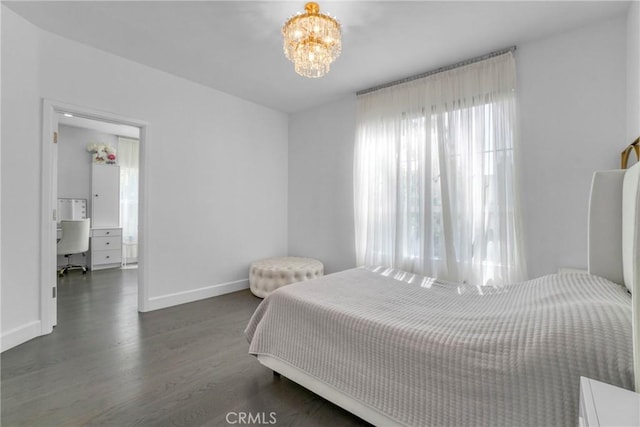 14347 Albers St Unit 207, Sherman Oaks, CA 91401 - bedroom with baseboards, wood finished floors, an office area, and a chandelier