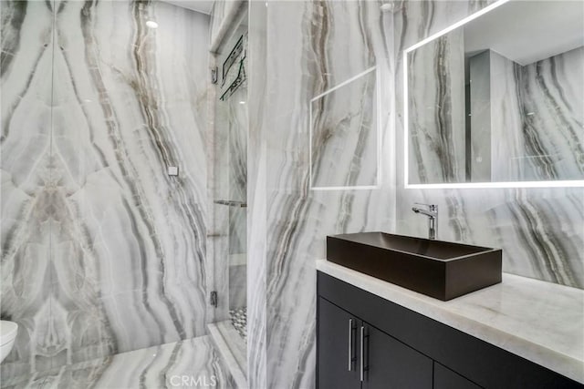 14347 Albers St Unit 207, Sherman Oaks, CA 91401 - full bath with toilet, vanity, and a marble finish shower