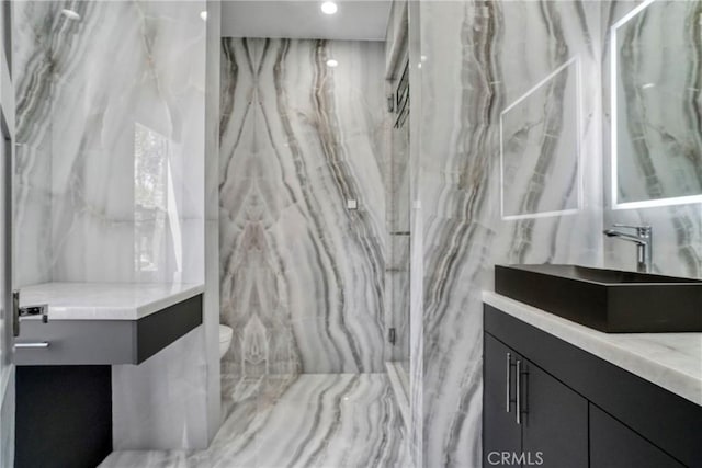 14347 Albers St Unit 207, Sherman Oaks, CA 91401 - bathroom featuring vanity, a marble finish shower, and toilet