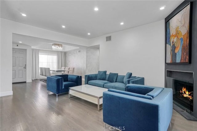 14347 Albers St Unit 207, Sherman Oaks, CA 91401 - living room with recessed lighting, wood finished floors, a chandelier, and a large fireplace