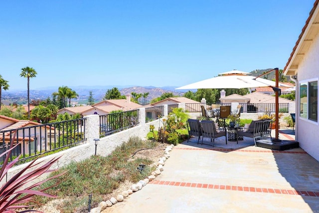 13356 Corte De Chucena, San Diego, CA 92128 - fenced backyard with a mountain view, a patio area, and a residential view