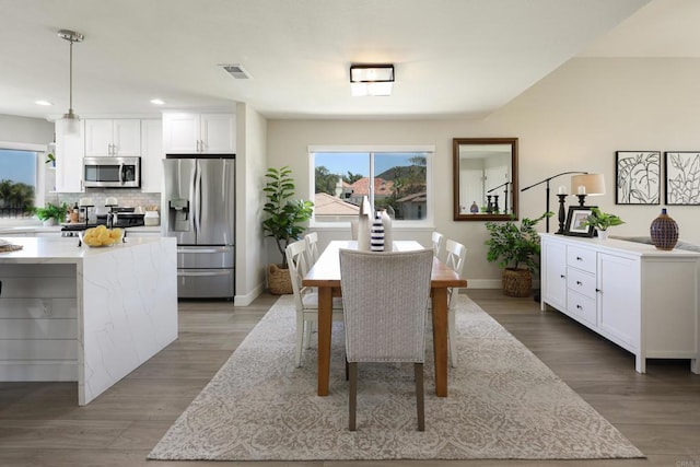 13356 Corte De Chucena, San Diego, CA 92128 - dining room with recessed lighting, baseboards, and light wood-style floors