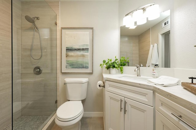 13356 Corte De Chucena, San Diego, CA 92128 - full bathroom with vanity, toilet, tiled shower, and baseboards