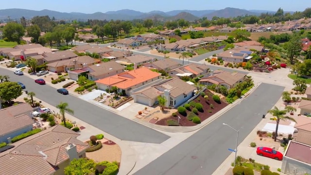13356 Corte De Chucena, San Diego, CA 92128 - aerial perspective of suburban area with a mountainous background