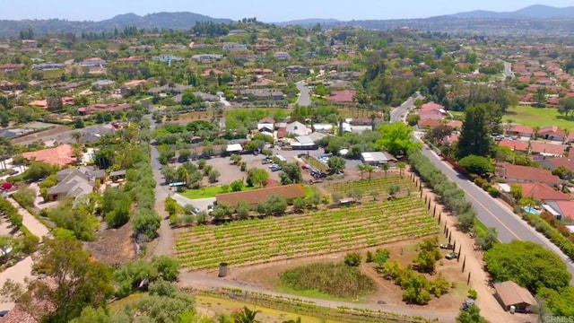 13356 Corte De Chucena, San Diego, CA 92128 - aerial overview of property's location with a mountain backdrop and large plots for crops