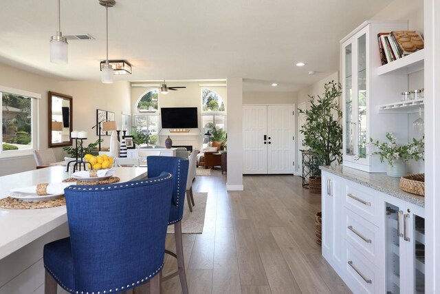 13356 Corte De Chucena, San Diego, CA 92128 - dining space featuring a ceiling fan, wood finished floors, and recessed lighting