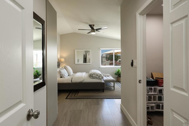 13356 Corte De Chucena, San Diego, CA 92128 - bedroom featuring wood finished floors, lofted ceiling, and ceiling fan