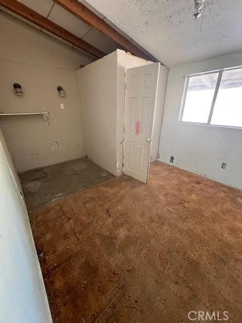 84673 9th St, Trona, CA 93562 - empty room featuring a textured ceiling