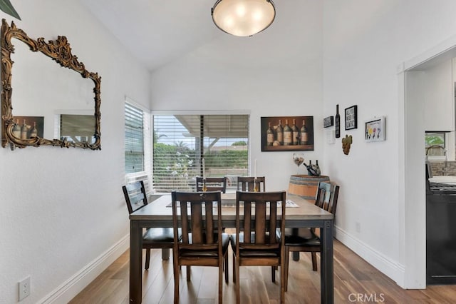 167 Camino Leon, Camarillo, CA 93012 - dining room with lofted ceiling, wood finished floors, and baseboards