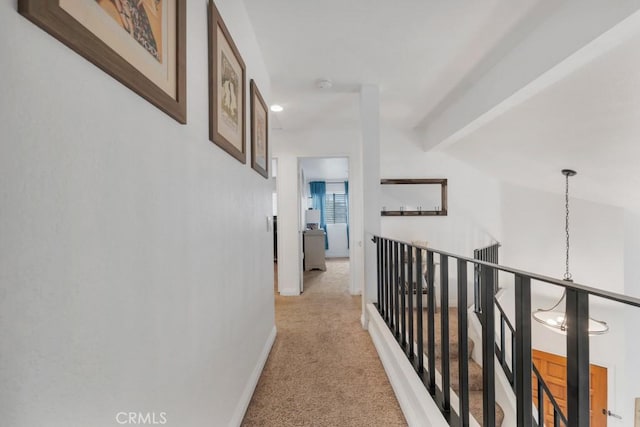 167 Camino Leon, Camarillo, CA 93012 - corridor with light colored carpet, baseboards, and an upstairs landing