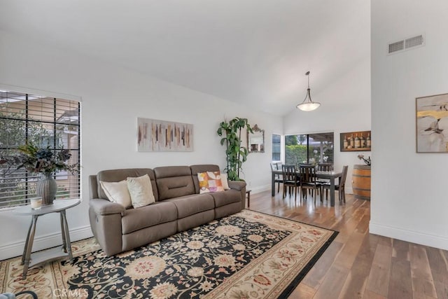 167 Camino Leon, Camarillo, CA 93012 - living room with baseboards, wood finished floors, and high vaulted ceiling