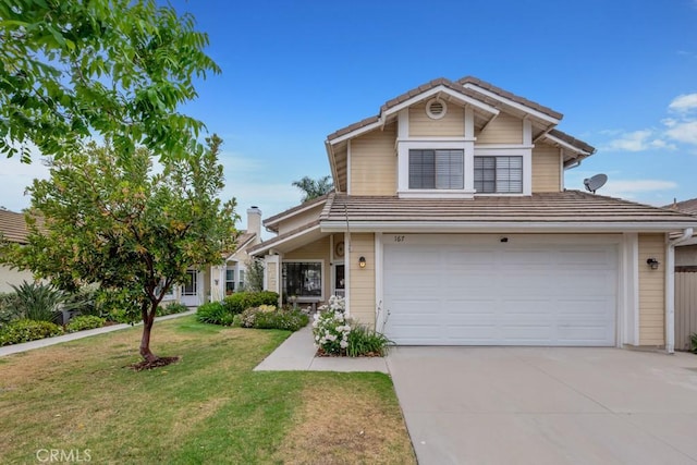 167 Camino Leon, Camarillo, CA 93012 - traditional-style home featuring an attached garage, driveway, a front yard, and a tile roof