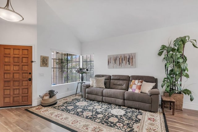 167 Camino Leon, Camarillo, CA 93012 - living area with wood finished floors, baseboards, and high vaulted ceiling