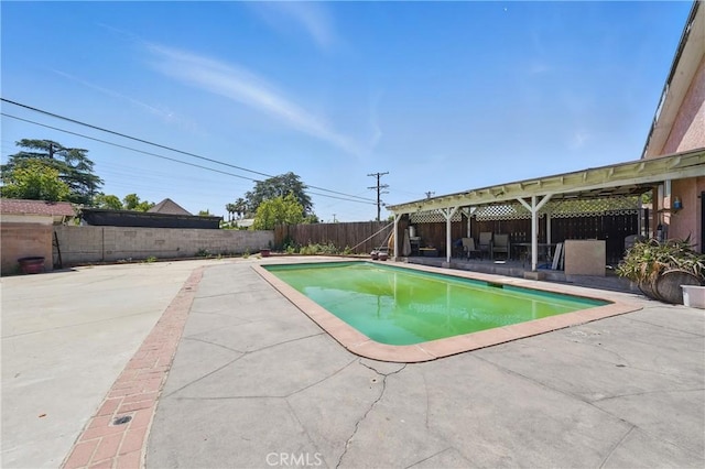 14276 Aztec St, Sylmar, CA 91342 - view of swimming pool featuring a patio area and a fenced backyard