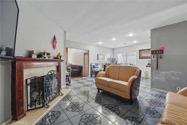 14276 Aztec St, Sylmar, CA 91342 - tiled living room with recessed lighting, baseboards, and a fireplace