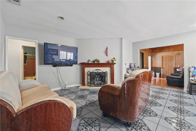 14276 Aztec St, Sylmar, CA 91342 - living area featuring tile patterned floors and baseboards