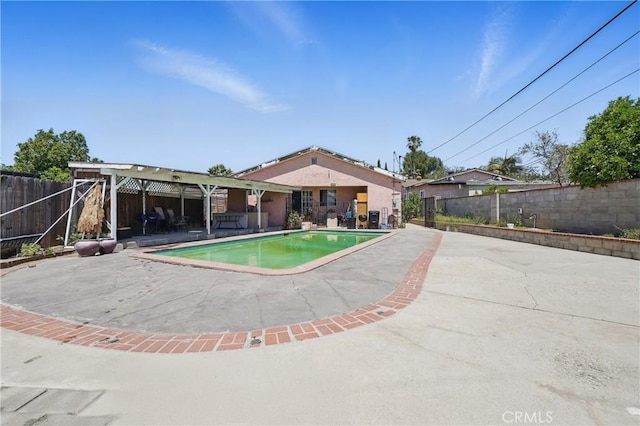 14276 Aztec St, Sylmar, CA 91342 - view of pool featuring a patio area and a fenced backyard