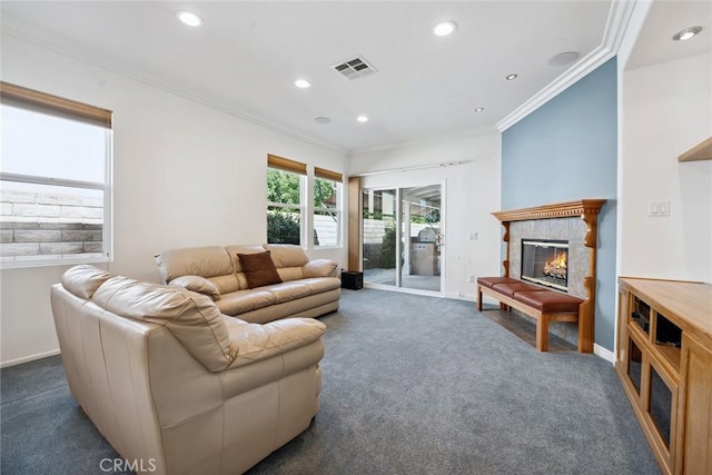 19613 Edmonds Pl, Saugus, CA 91350 - living area featuring dark colored carpet, ornamental molding, a tiled fireplace, and recessed lighting