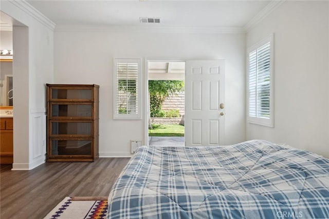 19613 Edmonds Pl, Saugus, CA 91350 - bedroom featuring dark wood finished floors and crown molding