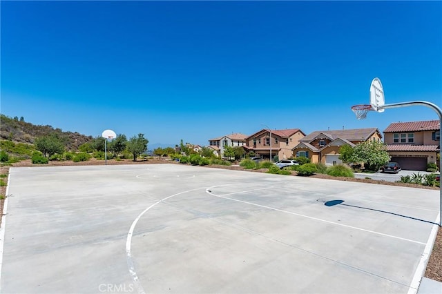 19613 Edmonds Pl, Saugus, CA 91350 - view of sport court with community basketball court and a residential view