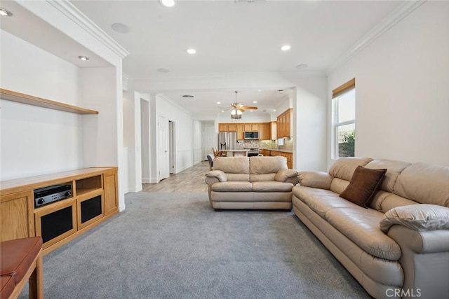 19613 Edmonds Pl, Saugus, CA 91350 - living area with crown molding, recessed lighting, light carpet, and ceiling fan