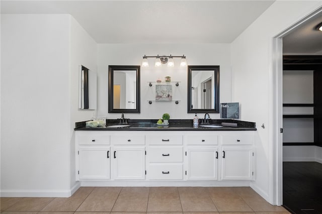 29083 Bent Tree Dr, Murrieta, CA 92563 - full bathroom featuring tile patterned floors, double vanity, and baseboards