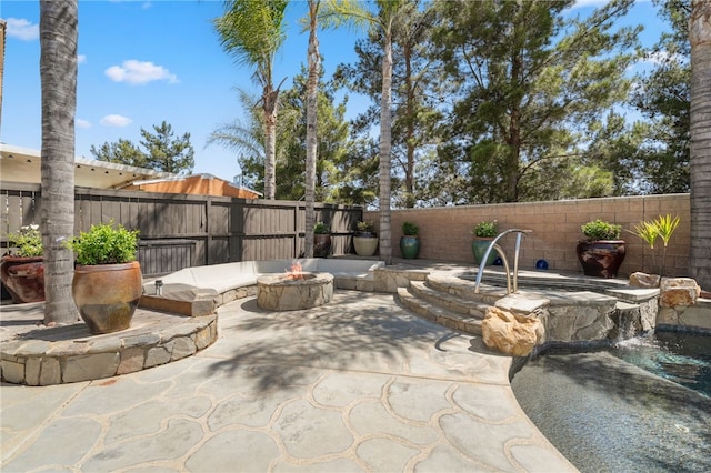 29083 Bent Tree Dr, Murrieta, CA 92563 - fenced backyard featuring an outdoor fire pit and a patio