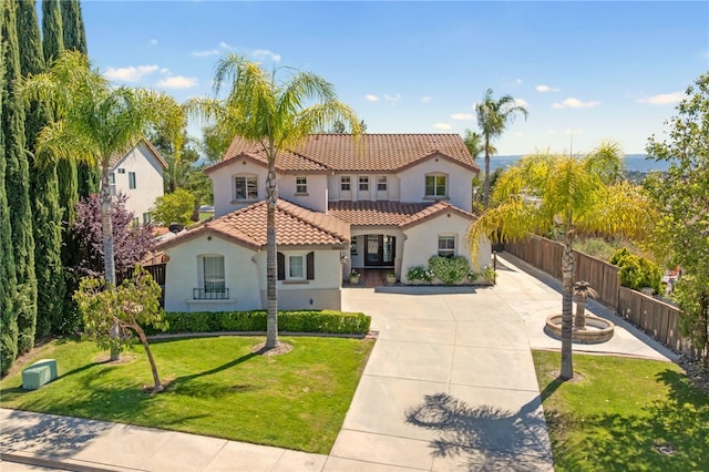 29083 Bent Tree Dr, Murrieta, CA 92563 - mediterranean / spanish-style home featuring stucco siding, a tile roof, and driveway