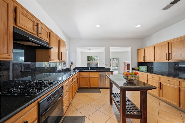 29083 Bent Tree Dr, Murrieta, CA 92563 - kitchen featuring black appliances, under cabinet range hood, decorative backsplash, a sink, and recessed lighting