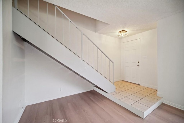 1926 Lucas St Unit 2, San Fernando, CA 91340 - foyer featuring wood finished floors, baseboards, and a textured ceiling