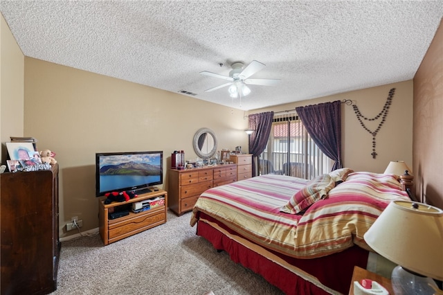 43195 Andrade Ave Unit L, Hemet, CA 92544 - bedroom with carpet flooring, ceiling fan, a textured ceiling, and baseboards